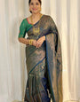 Invaluable Dark Green Soft Silk Saree With Improbable Blouse Piece
