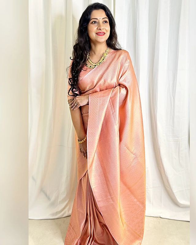 Cynosure Baby Pink Soft Silk Saree With Twirling Blouse Piece