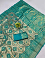 Jubilant Firozi Kanjivaram Silk Saree With Beautiful Blouse Piece