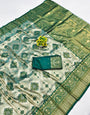 Hypnotic Green Kanjivaram Silk Saree With Gorgeous Blouse Piece