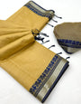 Beguiling Dark Beige Cotton Silk Saree With Moiety Blouse Piece