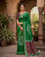 Engrossing Dark Green Printed Cotton Silk Saree With Gleaming Blouse Piece