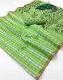 Impressive Green Printed Cotton Silk Saree With Allure Blouse Piece