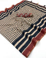 Enigmatic Beige and Black Printed Cotton Silk Saree With Super classy Blouse Piece