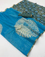 Glowing Firozi Printed Cotton Silk Saree With Engaging Blouse Piece