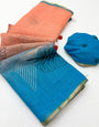 Snazzy Peach and Blue Printed Cotton Silk Saree With Prettiest Blouse Piece