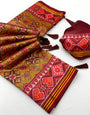Elaborate Mustard Printed Patola Handloom Silk Saree With Gossamer Blouse Piece