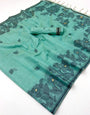 Scintillating Sea Green Pure Munga Cotton Silk Saree With Exuberant Blouse Piece