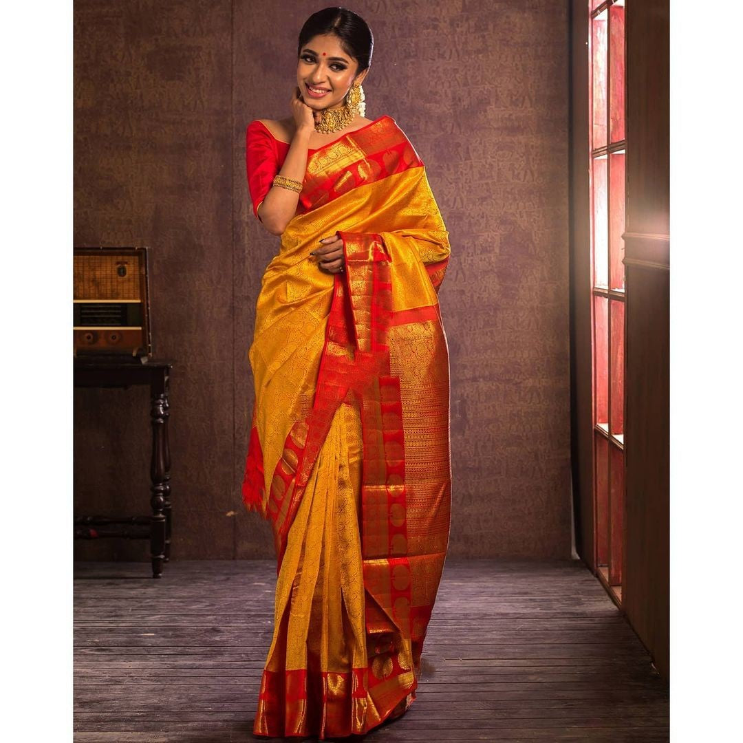 Phenomenal Yellow Soft Banarasi Silk Saree With Artistic Blouse Piece