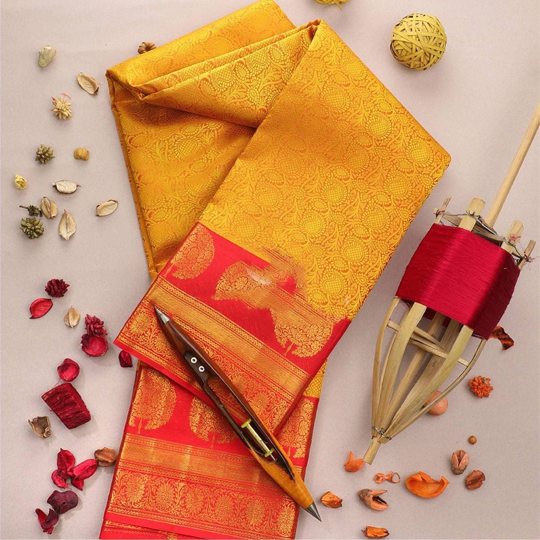 Phenomenal Yellow Soft Banarasi Silk Saree With Artistic Blouse Piece