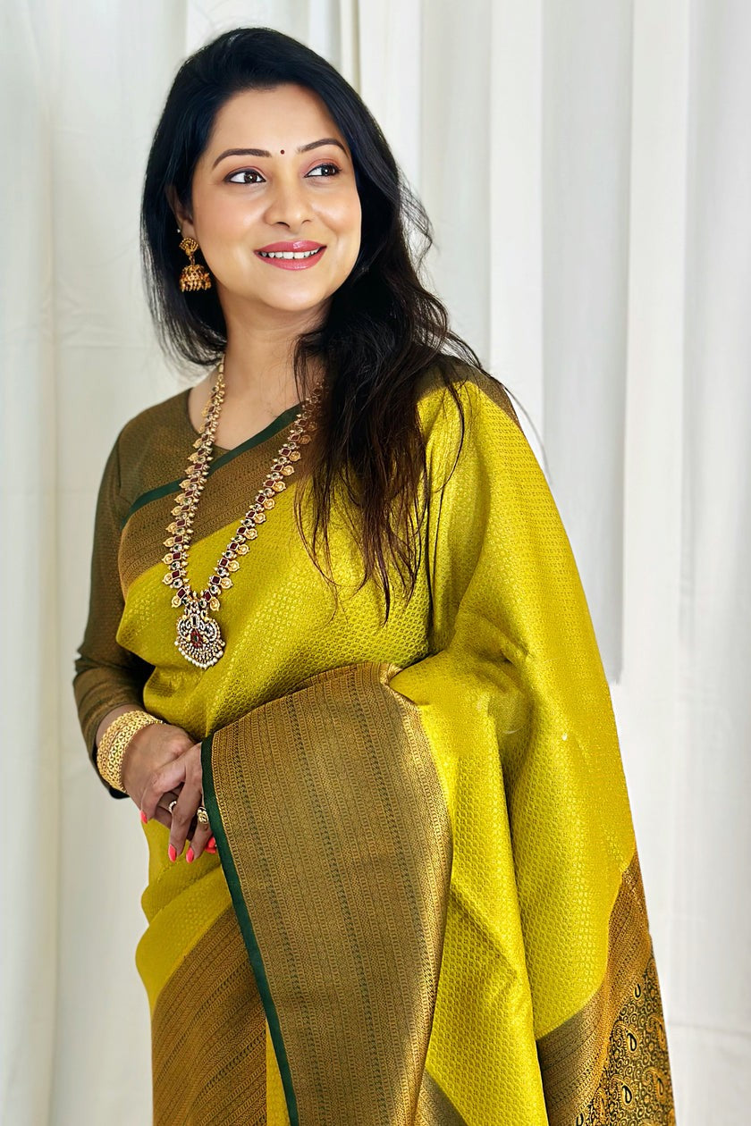 Amiable Lemon Soft Silk Saree With Ephemeral Blouse Piece