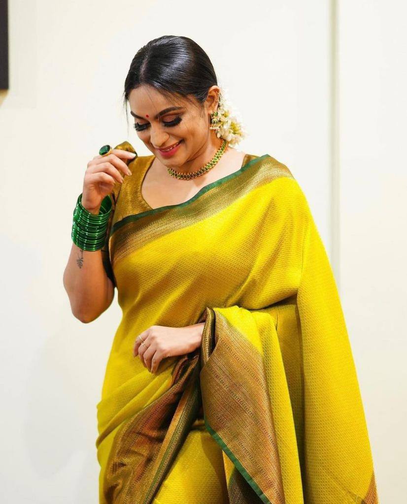 Lagniappe Yellow Soft Silk Saree With Divine Blouse Piece