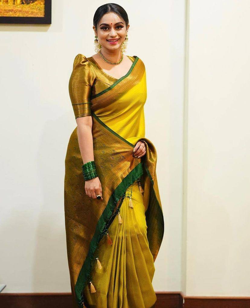 Lagniappe Yellow Soft Silk Saree With Divine Blouse Piece