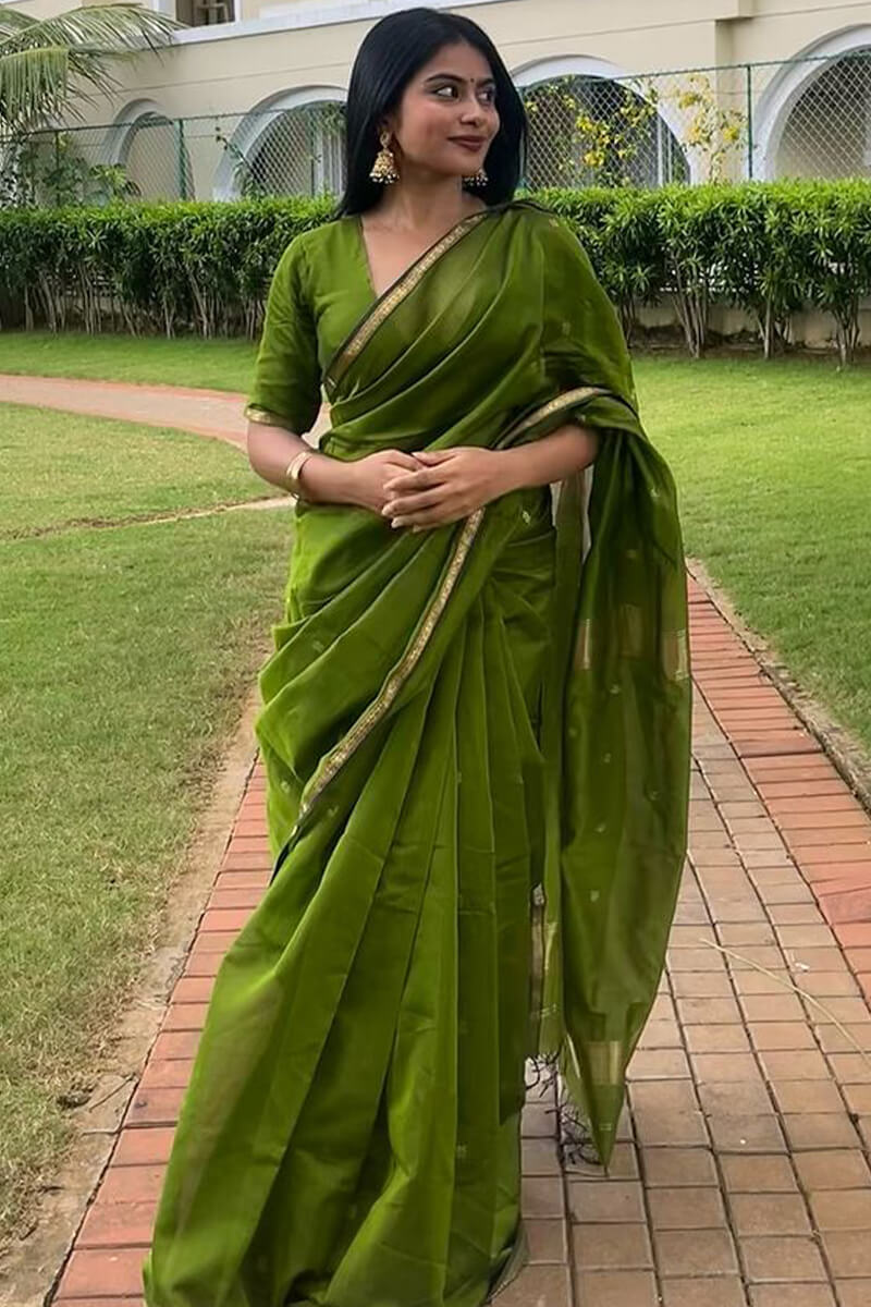 Scrumptious Green Cotton Silk Saree With Proficient Blouse Piece