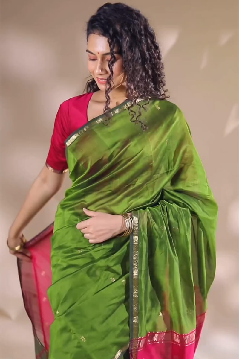 Whimsical Green Cotton Silk Saree With Improbable Blouse Piece