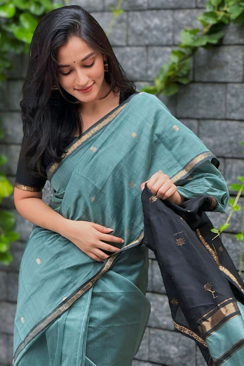 Effervescent Sea Green Cotton Silk Saree With Conflate Blouse Piece