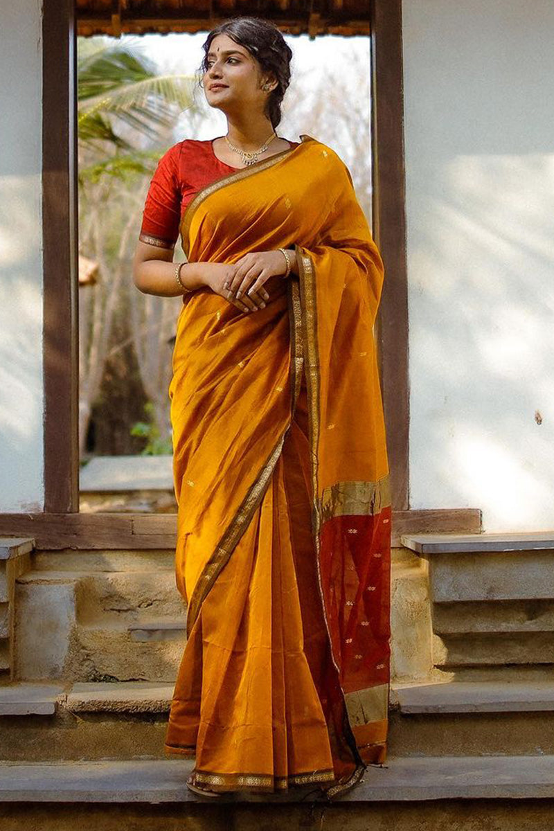 Elaborate Yellow Cotton Silk Saree With Staggering Blouse Piece