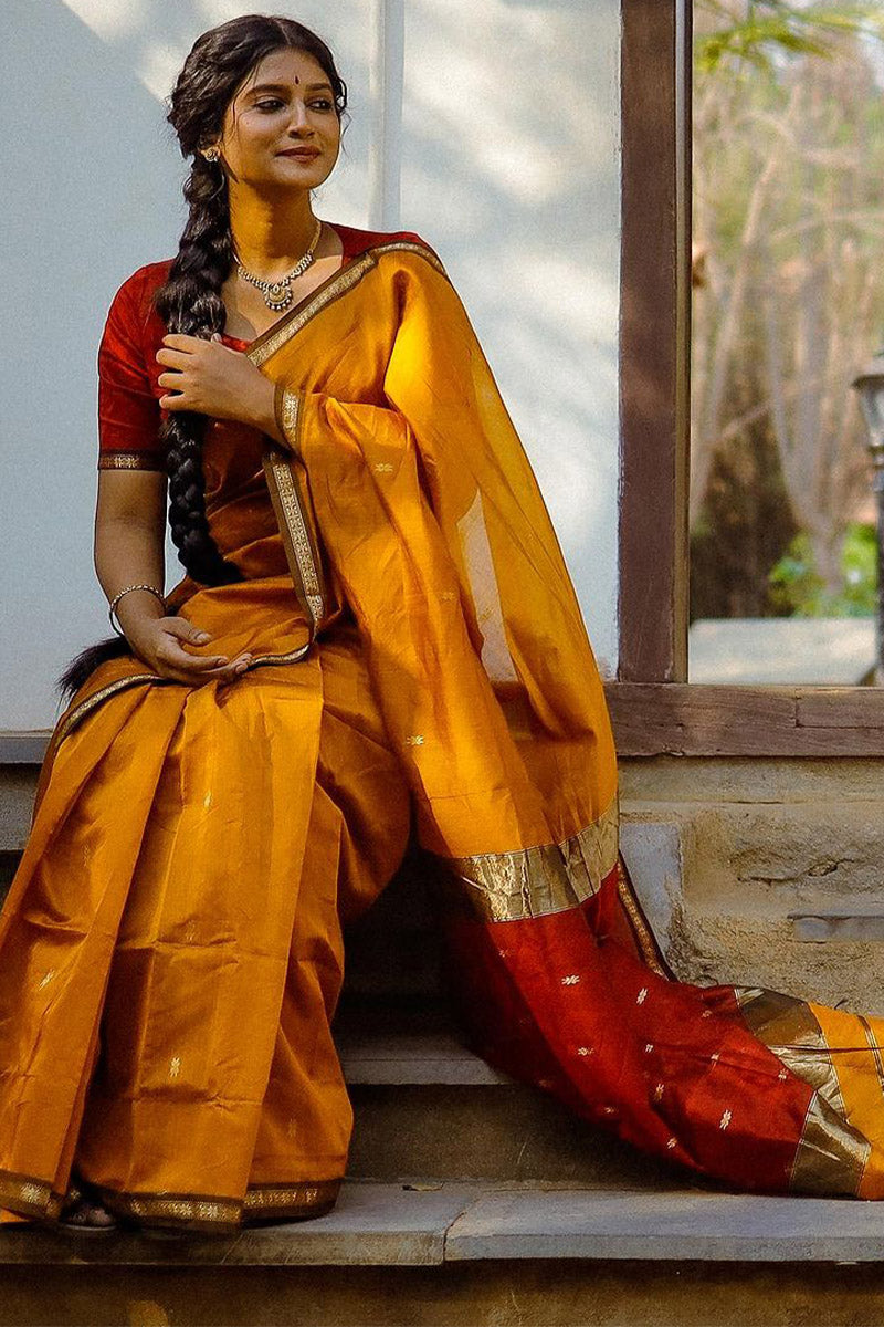 Elaborate Yellow Cotton Silk Saree With Staggering Blouse Piece