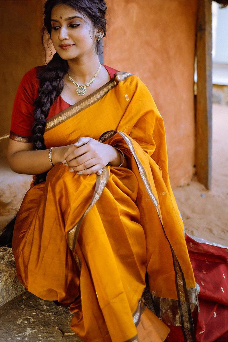 Elaborate Yellow Cotton Silk Saree With Staggering Blouse Piece