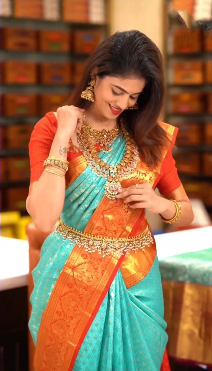 Arresting Turquoise Soft Silk Saree With Denouement Blouse Piece