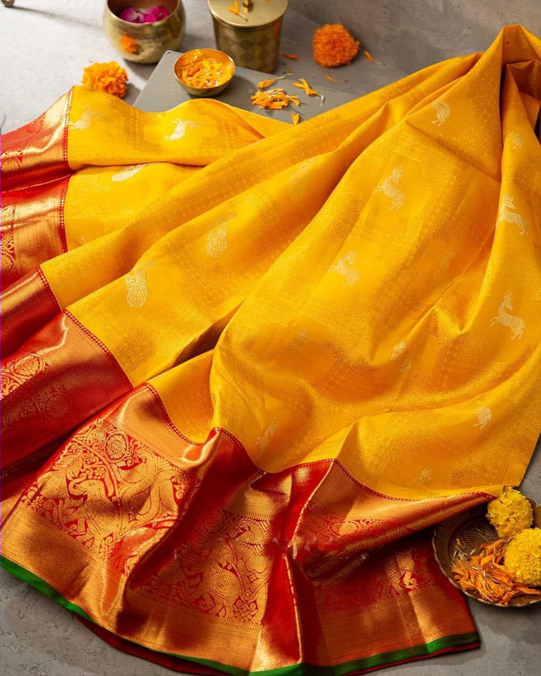 Palimpsest Yellow Soft Banarasi Silk Saree With Traditional Blouse Piece