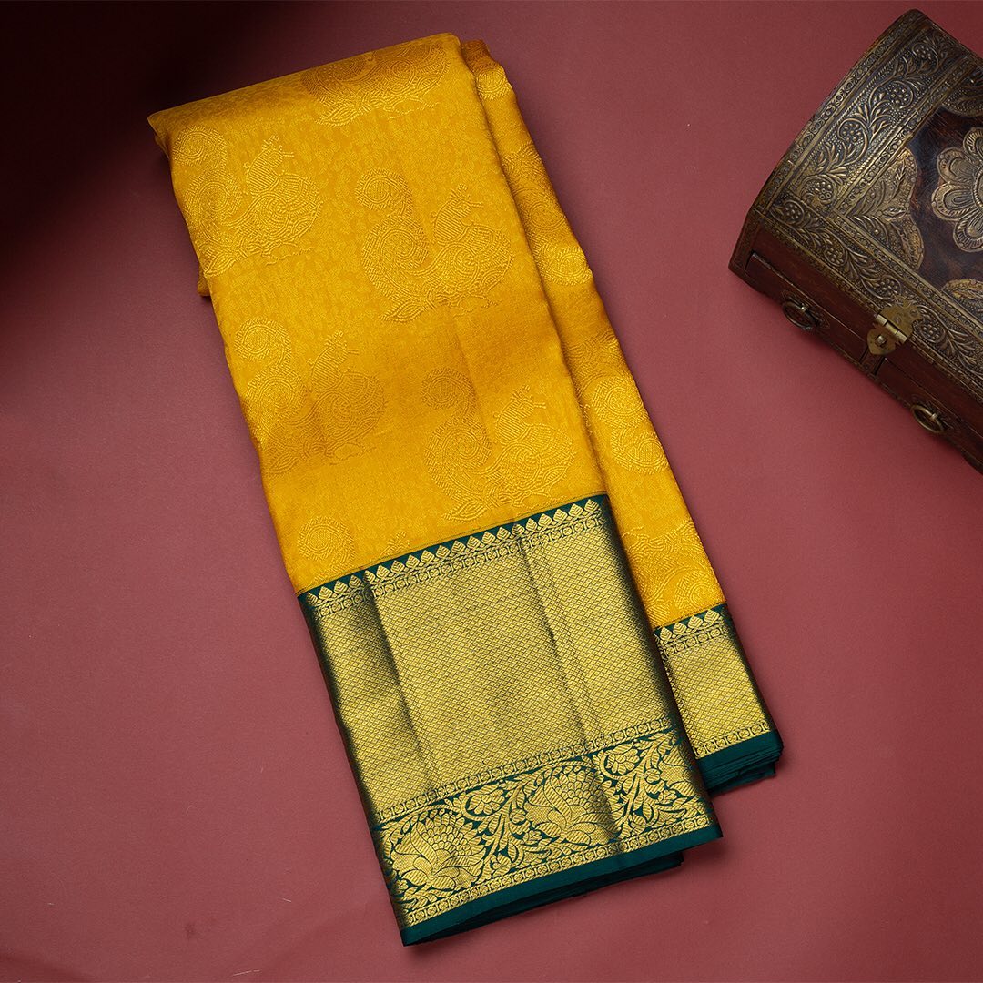 Elision Yellow Soft Banarasi Silk Saree With Resplendent Blouse Piece