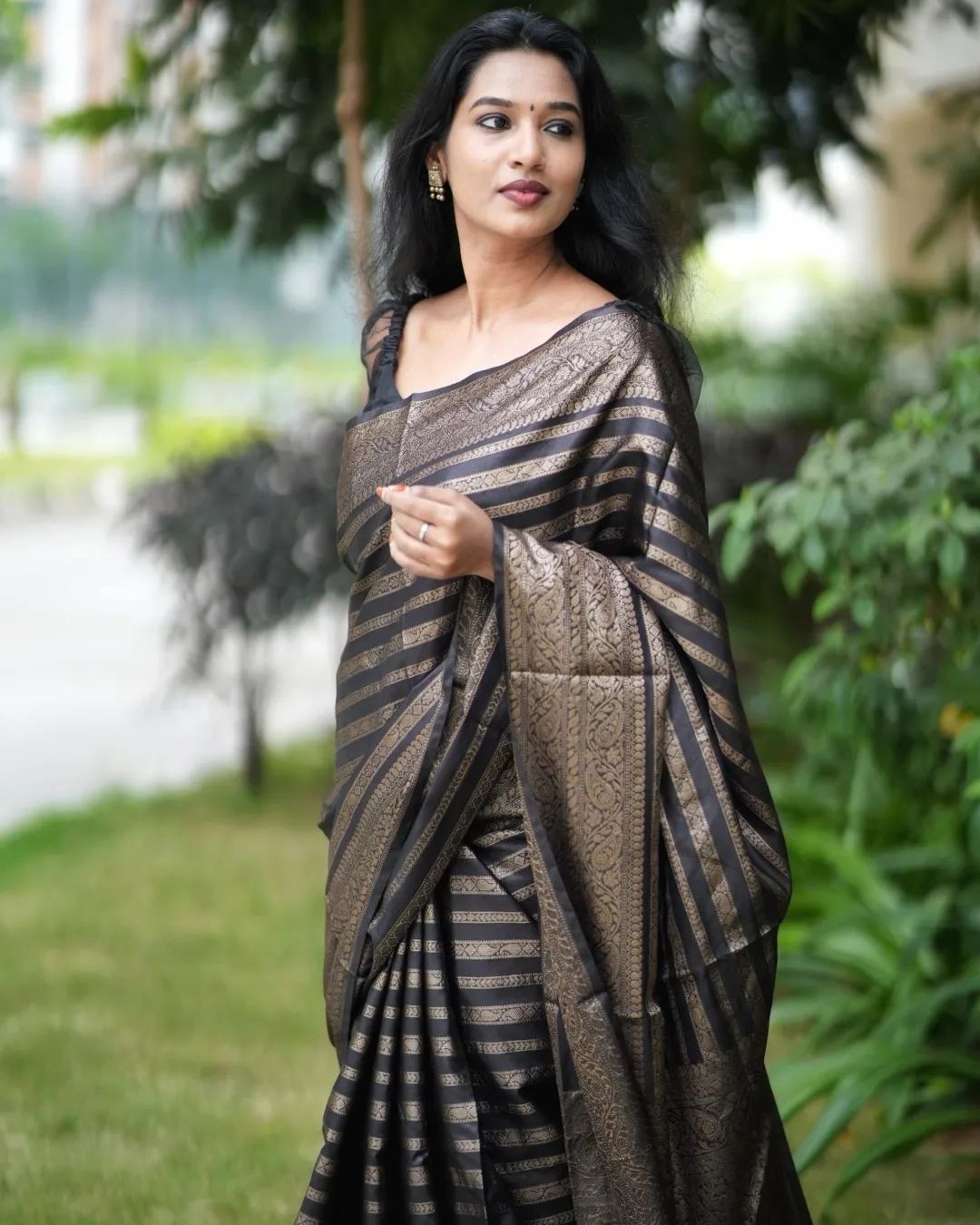 Scintillating Black Soft Silk Saree With Glamorous Blouse Piece