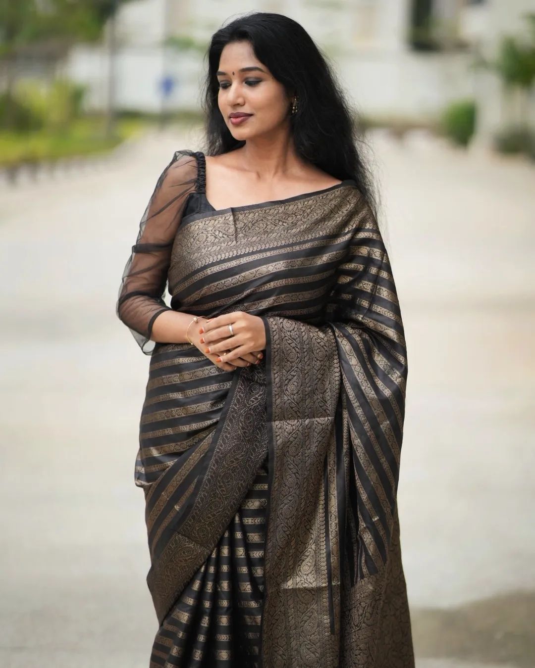 Scintillating Black Soft Silk Saree With Glamorous Blouse Piece