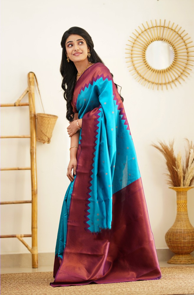 Vestigial Firozi Soft Banarasi Silk Saree With Sumptuous Blouse Piece