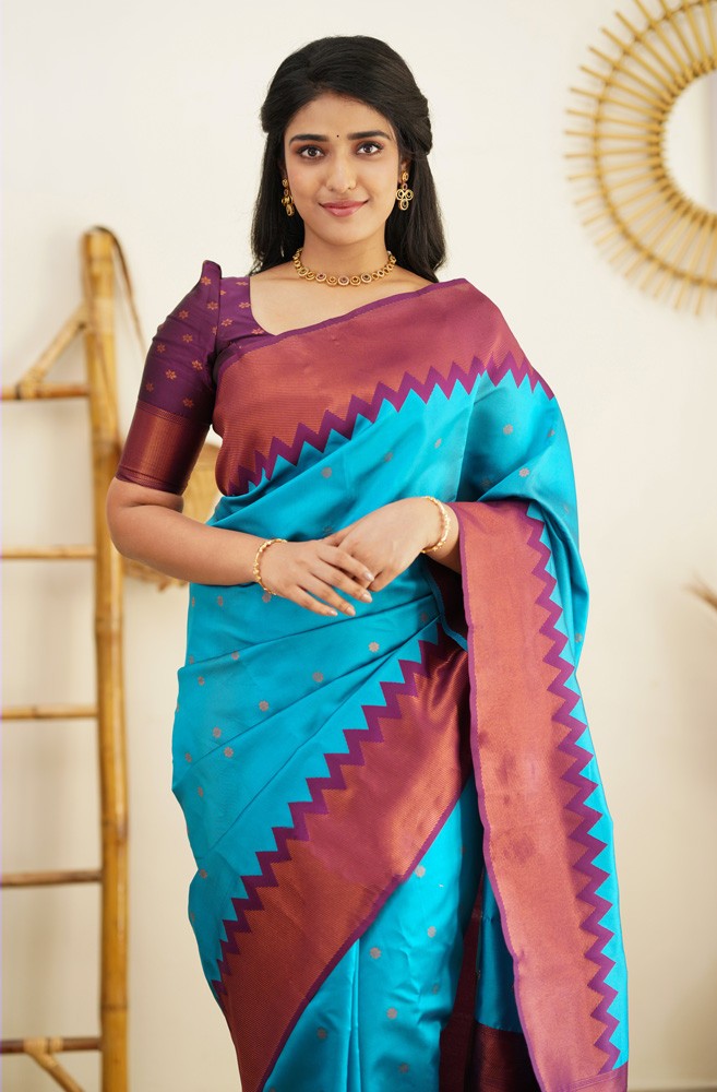 Vestigial Firozi Soft Banarasi Silk Saree With Sumptuous Blouse Piece