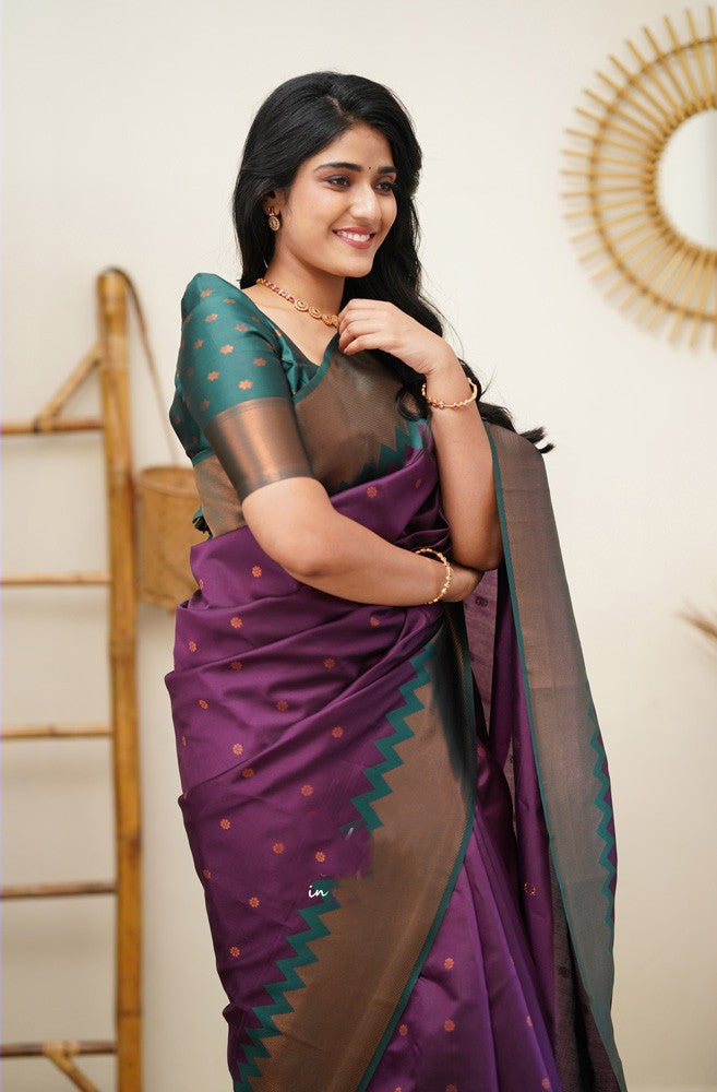 Cynosure Purple Soft Banarasi Silk Saree With Chatoyant Blouse Piece