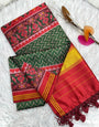Admirable Dark Green Ikkat Printed Patola Silk Saree With Luxuriant Blouse Piece
