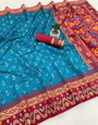 Extraordinary Firozi Banarasi Ikkat Silk Saree With Gorgeous Blouse Piece