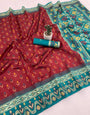 Propinquity Maroon Banarasi Ikkat Silk Saree With Zephyr Blouse Piece