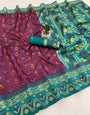 Stylish Wine Banarasi Ikkat Silk Saree With Sonorous Blouse Piece
