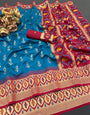 Intricate Firozi Banarasi Ikkat Silk Saree With Engaging Blouse Piece