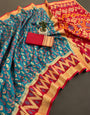 Nectarous Firozi Banarasi Ikkat Silk Saree With Appealing Blouse Piece