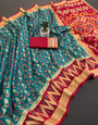 Glowing Rama Banarasi Ikkat Silk Saree With Nebula Blouse Piece