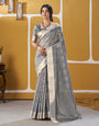 Lustrous Silver Zari Weaving Linen Silk Saree With Classic Blouse Piece