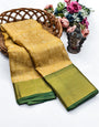 Quintessential Golden Soft Tissue Silk Saree With Chatoyant Blouse Piece
