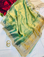 Glittering Pista Tissue Silk Saree With Impressive Blouse Piece