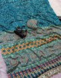 Gorgeous Firozi Ajrakh Printed Mirror Work Satin Silk Saree With Ebullience Blouse Piece