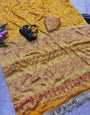 Scrupulous Yellow Ajrakh Printed Mirror Work Satin Silk Saree With Energetic Blouse Piece