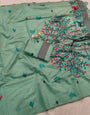 Diaphanous Turquoise Pure Munga Cotton Silk Saree With Glamorous Blouse Piece