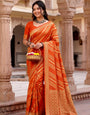 Beguiling Orange Banarasi Khadi Silk Saree With Allure Blouse Piece
