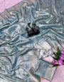 Engrossing Firozi Banarasi Tissue Silk Saree With Prettiest Blouse Piece