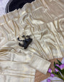 Staring Beige Banarasi Tissue Silk Saree With Whimsical Blouse Piece
