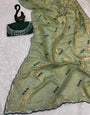 Glowing Green Sequence Work Fandy Silk Saree With Sumptuous Blouse Piece