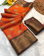 Hypnotic Orange Banarasi Dola Silk Saree With Skinny Blouse Piece